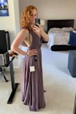 Really pretty dress and nice fabric. However, the length is super long. Even with heels, I would need a substantial amount of hemming. There is enough fabric that it would be an expensive hem. If you're tall or don't mind the cost of hemming, the cut and feel of the dress are great though. Very flowy! - Kacey W.