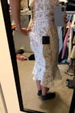 I wanted to keep this dress so bad, but I had to return it. The dress fit perfectly in the front, but the back paneling was too large. I could grab a handful of dress material in the back and still had extra room. I have an hourglass figure and thought this dress would work because of the way it goes in at the waist, but alas, it did not! Wish they had an XXS! - Tiffany L.