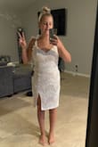 At first glance its so pretty! the quality is good the lace is nice by I'm 5'4 so it was a little long and awkward, but I think Midi's are just like that. It also... just didn't fit me right. I'm curvy but by no means anything crazy and I look like a box, see pic. Also the shoulder ties are a great idea and super cute but they're like a soft material so they slide off your shoulders and its kind of hard to get them even. I debated on returning this for a while bc I wanted to love it and decided I'd alter it and see if I like it more. See picture 2, I took up the length and brought in the waist. It looked a ton better! The shoulder ties still kind of annoyed me and idk I just didn't feel pretty in this. I cant return now bc it's altered which is fine but I wish I wouldnt have tried to force it. - Amber M.
