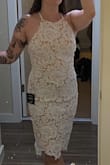I bought this for a special occasion and I'm really excited about how it fit me. I was choosing between this and another dress and this is the one I chose! I wrote that the dress runs a tiny bit small only because the other dress  I ordered in the same size, (small) and that dress had a little more room in it for movement. As a shorter girl, it definitely has a little extra fabric in the waist/underboob area, but I feel good about it. I think this dress is super flattering, the zipper is better than the other dress I tried and I didn't want to take it off. I would recommend this dress. I would say this dress has very little stretch though so if you are between sizes consider buying both sizes to see which fits better. - Bailey R.