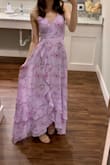 Wore this dress to a wedding and loved it! I got the straps altered since they ripped and had the bust sewn so it wasn't so low but then it was the perfect dress. The back touched the ground with heels but it didn't matter since the dress was higher in the front so I didn't trip all night. I also wore a sticky bra so it didn't show in the back. I received many compliments! - Sarah S.