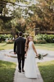 I read reviews saying if you're in between sizes to order a size down. I'm normally a small so I got an XS. It zipped up but was definitely snug, the shoulders were a bit big but with some fashion tape they were fine. I wore it for our engagement shoot and it was dreamy. - Samantha M.