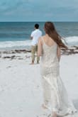 I usually wear a medium due to being tall, but a small would have worked much better for me! The train was a little too long almost on me, which made it hard to walk around in and it definitely got dirty before the wedding even started. Otherwise, it was a great dress! - Madison T.