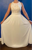 I was looking for anniversary dress for beach pictures. The skirt is 3 layers, but still floats around and could probably work well for pictures to have it trail behind a bit. I appreciate that this dress could've worked with 2-3 inch heels, I only needed a normal bra, and no part of the dress was see through at all. (I ultimately went with a different dress because this one was just a little too heavy for the standing under the hot sun/running through sand). - Maranda B.