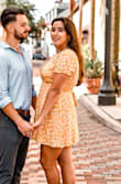 I bought this dress for our engagement photos and I absolutely love it!

The neckline is low but was actually very secure for me, as opposed to other shirts and dresses I've tried where you have to constantly be on guard. Also, it was short but not too short that you need to really think about out how you're going to pick up something that you dropped. At least for my height and proportions.

The material is of a great quality, too. In terms of maintenance, it was a very easy wash and line dry, but I also had to low iron it.

It's very tempting to get this in another color. - Tara S.