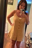 This is cute. But it's not fitted at the waist at all. I washed it and dried it hoping to shrink it a bit before I wore it. It did shrink a little. But not much. I wish it was a little more fitted at the waist. - Johnna A.