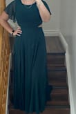 This dress is gorgeous and so flattering. I wasn't sure if I would be an XL or L. The waist and top fit very comfortable the XL would have been too loose. The slit in the back isn't too open, still lots of coverage the slit also is at a good length. Can definitely wear a regular bra and the length is good, not too short or long - Victoria G.