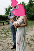 I loved this dress and it was so perfect for my elopement in Denmark! My fiancé is from Norway and I'm from the US, so we decided to elope in Denmark after postponing our US wedding twice due to travel restrictions. Although it was a bit long, this dress fit me perfectly (note: you can't adjust the straps) and I loved the body suit design with the high slit. The sales associate at Glitter (Scandinavia Claire's) offered to buy it from me after I was done with it, but I decided to keep it for my reception at the US wedding in 2022! - Mary B.