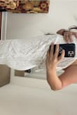 It looks like a $1000+ dress and I almost took it to go get altered but I bought another Lulus dress that fit perfectly. Unfortunately I'm going to have to return this one. - Carol L.
