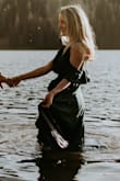 This dress was absolutely perfect for my photos!! It was a little long for my height in boots but it just added to the drama of the photos which I loved!! Got a small in Dark Green! - Jeri H.