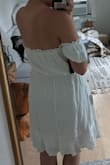 I loved the flow and fit of this dress. I returned it because the fabric for the slip on sleeves does not go all the way around your arm. Look at my photo you can see that it does not continue under the arm. It looks weird when you lift up your arms. - Christie S.