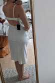 Very cute fit but this dress is unwearable. It is unlined and the fabric is very thin and completely see through. Because the back is open you cant wear a nude slip underneath. There is also a weird fold over of fabric halfway through the chest. It sticks out and cheapens the dress. Had to return. - Christie S.