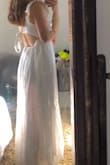 In love with this dress, super comfy, has pockets!! Easy to slip on and the tie at the back is so cute. The materials used are really nice, there is even an under layer. I would go a size smaller just because it is such a stretchy giving material. I definitely recommend!! - Caitlynn C.