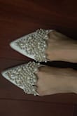 I've been eyeing these for months, but the ivory color has been out of stock this whole time. I got these the moment that they were back in stock and, WOW, these are gorgeous.  I was amazed by the intricate detail and quality of the shoes, especially for the price.

I do think these run a bit small. I am usually a 7.5 - 8, and these size 8 barely fit me (heel is right at the edge of the shoe).  If you are usually between sizes, I would suggest going with the larger size. - Rebecca Z.