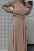 Overall too big for a double extra small.
I'm 5.2 and I weight 101 lbs, I'm very petite but I'm not underweight (I look thicker than the model in the photo) but it was still too large on my waist and breast (I want to specify that I looked at the size chart before purchasing it).
I expected it to be too long, but the dress seems made for a 6 ft model. it is excessively long! The average height for women in the US and Europe is 5.4! Getting the dress fixed for my body would cost a lot of money and I have already spent over 100 euros on this dress between initial price, shipping, and taxes.
I also wouldn't recommend this color if you have fair skin (it's summertime here in Italy and I have a light tan but the color still doesn't look good on me). - Chloe S.