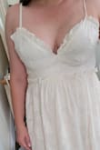 I ordered this dress for my engagement pictures. It took me a really long time to decide what to order, but I felt confident in this because I fit the measurements exactly for a large. 39" bust, 31" waist, 42" hips. When I tried it on, it fit perfectly with the length (which was nearly floor length on me, but I expected that and wanted it) and the waist. However, the cups just were not right. It squeezed me down, creating a "muffin" effect. It is just too uncomfortable and unflattering to keep. I would consider sizing up, it's already out of stock. I would say that when they state this dress is best for A-C ladies, they mean it, regardless of measurements. - Sarah B.