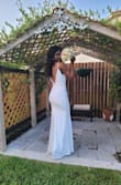 My dress is have an open back so I had to take of some part of the belt off but other than that it is beautiful. - Joana-grace B.