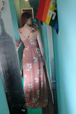 This dress would be perfect if it wasn't so long. I feel it was made for tall people. I still love the dress and just got it shortened, however another down side is the slit does not show. I'm not sure if this is again because I am too short, or it's just not lined up properly, but even when I walk the slit doesn't show. It was quite disappointing , but dress fits otherwise. Color is exactly like the photo. - Sasha K.