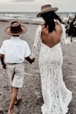 This is dress absolutely gorgeous! We had a vow renewal on the beach and this dress couldn't be more perfect. I'm 4'11 so it was long for me, but since we were barefoot on the beach it didn't bother me. I did alter the back of the dress, I bought it with the intention to do so. - Natashia A.