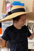 I love how ridiculously large this hat is to provide shade but my only qualm is the fit. It's too loose and slides around my head, can't seem to secure it. I am considering returning since I would have to stay still if I wear it for fear of it falling off. - Linda M.