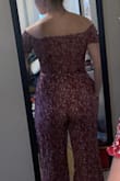 I wanted to love this jumpsuit so badly; it's really cute and a great pattern! The material is really thin-feeling though and the pockets made my hips stick out in an odd way. My torso might be a bit long but it gave me a bit of camel toe, too. Just not worth this price tag. - Lizzy C.