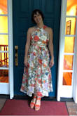 The dress fit perfectly in the bust and waist, but was SO incredibly long, not even my tallest heels would get it off the ground. My mom and I sew, so we could shorten it. Since we had to make it shorter anyways, I decided to make it a midi length. We cut off about a foot in length and made a scarf for her. :) - Andria Q.