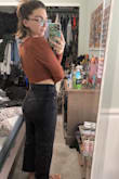 This shirt is super cute! Love the v wire in the front and the little puff on the shoulders. My only complaint is that it's a lot more cropped than it looks on the model. To be fair I do have a long torso but this shirt still only falls an in and a half below my bust. Must be worn with super high waisted jeans - Darian W.