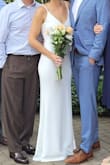 This was the best wedding dress for my intimate wedding. I wore smaller heels and needed about an inch hemmed and then had them sew the straps to the length I needed to get rid of the adjustable straps - I felt it made the dress look more expensive. Overall great support in the chest area, I wore petals and felt supported. Highly recommend this dress. - Hannah P.
