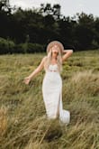 Ordered this dress for a photoshoot and was a little nervous it would be see through. Ended up fitting perfect! The material is lightweight and was everything I dreamed of for the shoot! Fits true to size! - Madison Y.