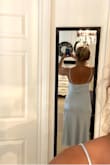 I wanted this dress to wear to a wedding, but it's just too bridesmaid-like. The colour is beautiful and the material feels good (very heavy, not a light satin). It's a beautiful dress if you have a small waist and large bust, I'm rather boxy so it didn't look great on me. It was much longer than I thought it would be and doesn't hug a figure like in the photo (unless you have a model figure like the photo).

Overall, BEAUTIFUL colour, heavy material which makes it feel quality, a cute slit, strangely placed lines, and not a hugging and then flowing shape like in the photos.

THIS DRESS IS MUCH LONGER THAN THE PHOTOS!! I'm 5'4.5 and it went almost to my ankles - Delaney S.