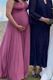 This dress was so cute and comfortable I wore it twice. Figured I'd get my moneys worth. I wore it for my sisters wedding and did a maternity shoot. I love the fabric. I will say the dress has some weight to it. - Starina M.