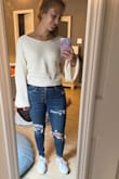 I LOVE this sweater. The material is great, and the back is so cute. I can't wait to wear this in fall.
As a petite girl, the only downside is that the sleeves are really long on me, but I'm still keeping it. - Lindsay D.