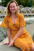 Gorgeous! I love wearing the dress, it's very flattering for curves. I'm glad I read reviews and went with a small (sometimes I'm a medium in more form fitting dresses). Just be aware that the material isn't stretchy and the seam under the bust is very tight. The top two buttons don't button, so I might pin it up more in the future bc it can gap when sitting down. Sandals are from Lulus too! - Katie B.
