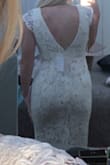 I love this dress! Beautiful and flattering. It is a little big on me, but I think an XS would be to tight ( they need to make an xs 1/2 LOL) but over all it is a really gorgeous dress! Can't wait to wear it for my wedding - Cienna G.