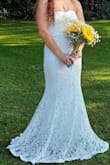 We had planned a surprise wedding that we planned in two weeks. Got the dress a week early and it was perfect except for the length. I planned to cut the bottom along the flowers but ran out of time. The dress picked up a lot of grass and twigs from the ground but got a lot of compliments on the dress!! And I'm 10 weeks pregnant and people had no idea!! Dress was super comfortable and light. - Dana M.