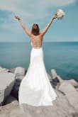 I bought this dress without being convinced and it came out in the mail the day of my wedding. I tried it on and it fit perfectly, like if someone made it just for me. Everyone said it looked amazing and it looks like a thousands dollars dress. I am beyond satisfied by this dress, thank you Lulus! (I'm French and I got married to my American boyfriend) - Margot D.