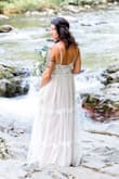 This dress is absolutely perfect. We had an outdoor wedding and I wanted a care-free, simple, bohemian style. I was leery of the cut because I have an athletic build and do not have great curves - but this material is thin and soft and moves with you. Very flattering with or without curves!  It's lightweight, but has a thin nude lining - no need for a slip. It fit perfectly when it arrived, the only alterations were to add cups to keep my girls in place and I had to have it hemmed a little since I was wearing flat sandals for the riverside wedding. Highly recommend! Great price too! - Julia H.