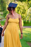 I loved this dress! I wore it for my graduation photos and it fit perfectly. The dress wasn't too tight and made my stomach look FLAT which I loved. It was flowing and perfect for warm weather. 10/10!! - Tiffany J.