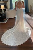 I'm very slender in the shoulders and have larger hips, therefore it was too big in the chest and too tight around my thighs. The lace, material, and train are beautiful. I decided on a different gown, so I would be more comfortable moving and sitting during my wedding day. - Kelsey G.