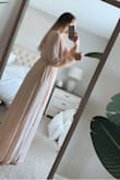 I am normally a large in dresses but this was out of stock in large so I thought I'd try a medium. It was still too big. I could have tried a small I feel like but it was not flattering on my chest so decided on a different dress. - Ashley K.