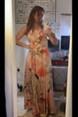 So excited to wear this to my cousin's August wedding at a Vineyard! First I ordered this in the pink floral, sadly it's not my color. I followed the size chart which put me at a small or a medium, but after reading reviews that said it ran large, I ordered a small. This dress runs REALLY large in my opinion. I tried S, XS, and XXS (which I never am) and the XXS fit the best. I ended up keeping green in XXS. The pink dress was more of a nude, and the green is more of dark forest green than emerald like the stock photo. Personally, I like the forest green better, so I'm very happy with the purchase. This dress is very well made and the fabric feels high quality. If you have an option, I would order 2-3 sizes and see what fits best, because it was a trial and error for me. The adjustable straps help a lot with bust issues, which was my problem with the XS. I have a small chest so the XS was gappy and draped weird. It fit well in the waist for both XS & XXS. Photos shown: XS in pink, XXS in emerald green. - Autumn B.