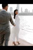 Wore it for my engagement photoshoot and absolutely adored it! I did have to get the length trimmed as it was long for me but the rest of the fit was great. - Srishti N.