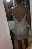 Fit true to size and I liked the sparkle. I bought it with my bachelorette party in mind but ended up returning it because I found a different dress but it was a fun dress - Kristen K.