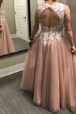 I was very happy to find this for my wedding dress. I ordered the size 2 since it was the smallest size and it was big on me. I had to get the straps shortened, have it hemmed, and I had the front v taken in a little so it wouldn't gape as much. I would have liked to have the waist taken in as well, but didn't want to mess up the pattern and it wasn't terribly big. The color was not as pink as the pictures, it was more nude which I didn't mind. I loved the design and it was perfect for my small, boho, outdoor wedding ceremony. The only disappointment was that it didn't come with a garment bag like it said it would in the description. Overall, I was quite happy with this dress for my wedding day for the price! The two pictures give you an idea of how the color can look in different lighting. (Also, I had to crop the pictures like that to be able to upload them.) - McKenzie R.