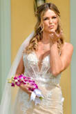 This dress is absolutely gorgeous! I was blown away with the look and quality of the dress when I received it. I took it right out of the box and put it on and I instantly knew this was the one for me! I said yes to this dress and a jump up and down yes to the price of it. lol. I wore it on my wedding day in Jamaica last week! When my hubby turned around and saw me his mouth dropped! It was exactly the reaction I knew I'd get from this beautiful dress. It also has just enough sexy to Make it more wow but keeps everything hidden nicely! I felt like I was a princess on my special day thanks to Lulus! I still can't believe the price of the dress and neither could anyone else! It looks like something you would get from a bridal boutique for about 1k or more. I even got in the ocean with it during our wedding photo shoot and it held up nicely!! All the women who asked me where I got it from were grabbing their phones and looking up Lulus website!! - Bridget P.