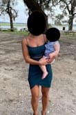I got an XS in this and a S in a very similar dress (pink one with no cutout) and this one fit better. After a couple drinks, you could definitely see my belly, but whatever. I am a woman so it is what it is. I am a S in juniors and an XS in women's usually, so I'd say this is a true fit. Just depends on how tight you want it (it does have a good stretch to it). I didn't have any problems with it riding up and I got quite a few compliments on it. Super high quality fabric as usual with Lulus. - Kaitlyn P.
