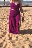 This outfit is everything! Gorgeous color, quality fabric, sexy fit. Wore to a beach wedding and got tons of compliments. I'm on the busty side (36G) and found the top to be very supportive even without a bra. The pants do run long, I had to take off a couple inches to wear them with flat sandals. Overall 9/10, super pleased with my first Lulus purchase. - Vivienne C.