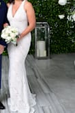 Planned a quick and private Covid wedding. This dress arrived on time and fit perfectly. I loved the small train. - Jennifer R.