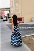 I'm in love with this outfit! I wore it on my birthday while on a trip to Vegas. I got so many compliments and I felt sexy, stylish and beautiful! The skirt was the perfect length for heels/wedges. A medium fit perfectly for both the top and skirt = - Danielle H.