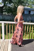 So glad I ordered this dress, it was perfect length with small heels it just draped the ground, the bodily fit was great, but I'm fairly small in the bust, so it was a tiny bit loose in that area, nothing a little fabric tape wouldn't fix though. The color changed a little depending on the light too! Thanks Lulus. - Samantha D.